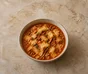 Zuppa di lasagne con manzo e pasta sotto una copertura dorata di mascarpone e Parmigiano
