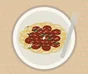 Spaghetti con sugo bolognese, Parmigiano e foglie fresche di basilico